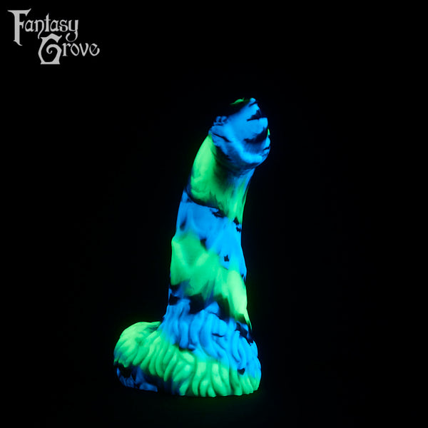 A fantasy sex toy on a black background with the Fantasy Grove logo in the upper left corner