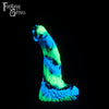 A fantasy sex toy on a black background with the Fantasy Grove logo in the upper left corner