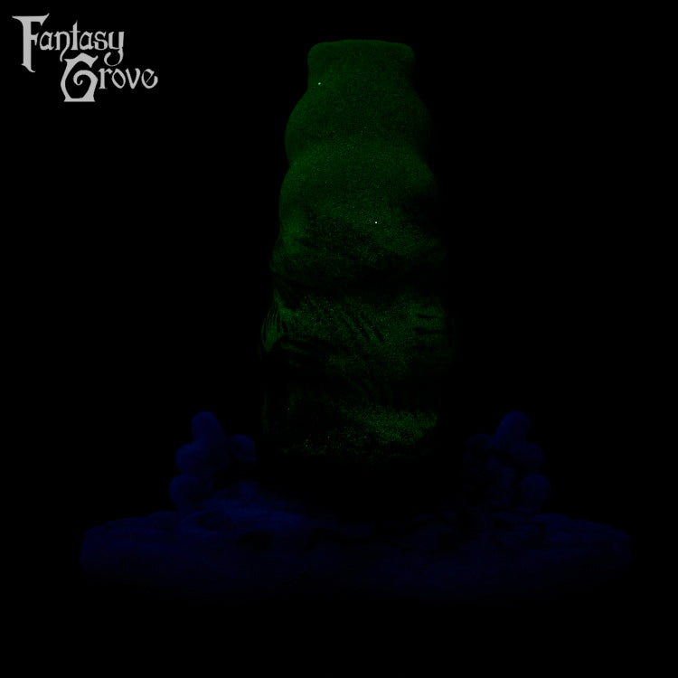 A fantasy sex toy on a black background with the Fantasy Grove logo in the upper left corner