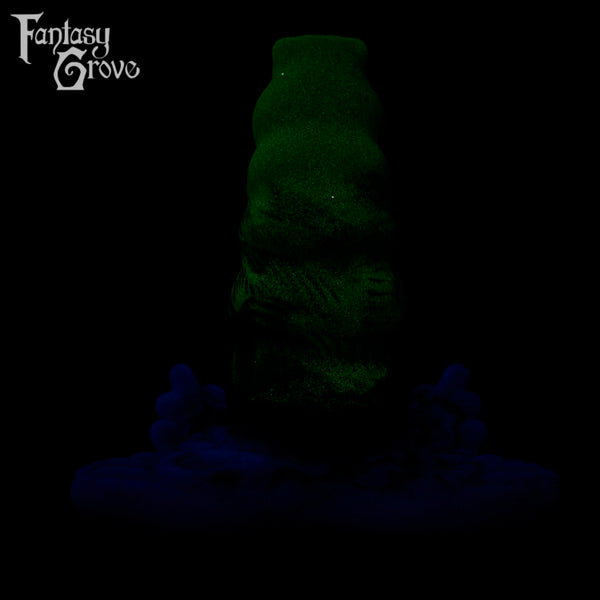 A fantasy sex toy on a black background with the Fantasy Grove logo in the upper left corner
