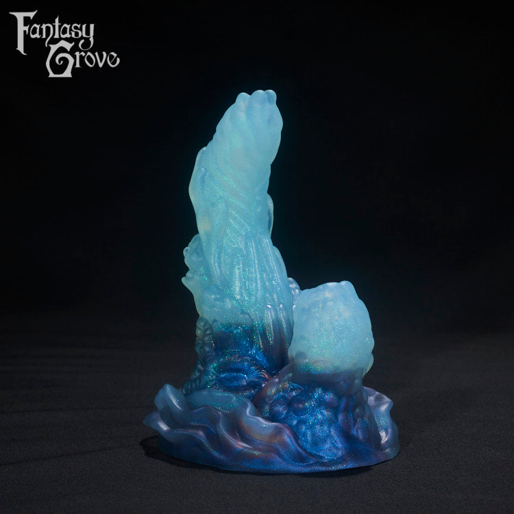 A Fantasy Grove sex toy on a black background with a logo in the upper left corner