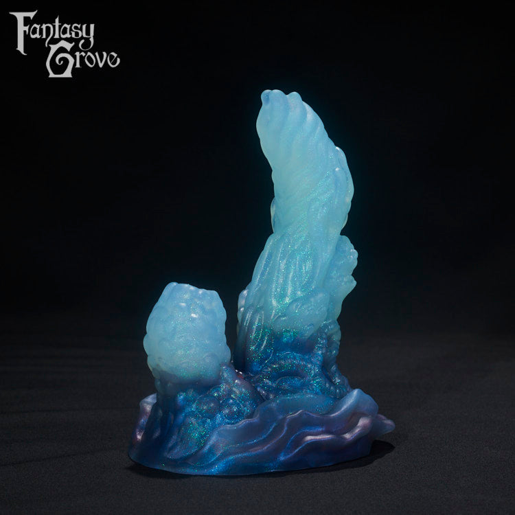 A Fantasy Grove sex toy on a black background with a logo in the upper left corner