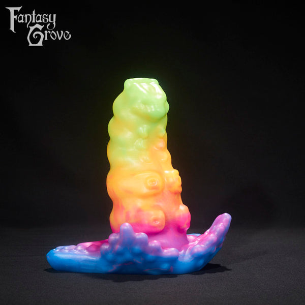 A fantasy sex toy on a black background with the Fantasy Grove logo in the upper left corner 