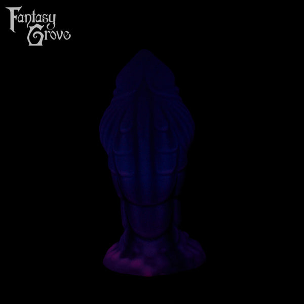 A Fantasy Grove sex toy on a black background with a logo in the upper left corner