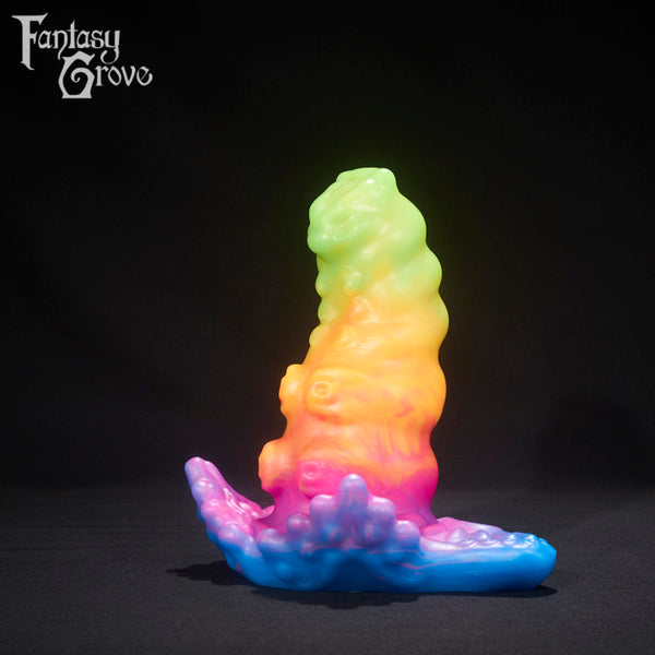 A fantasy sex toy on a black background with the Fantasy Grove logo in the upper left corner 