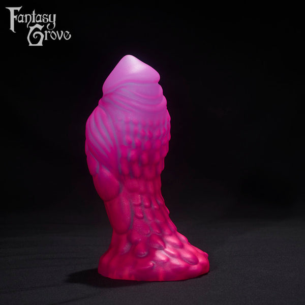 A Fantasy Grove sex toy on a black background with a logo in the upper left corner