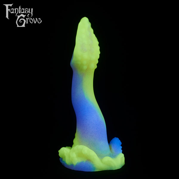 A fantasy sex toy on a black background with the Fantasy Grove logo in the upper left corner