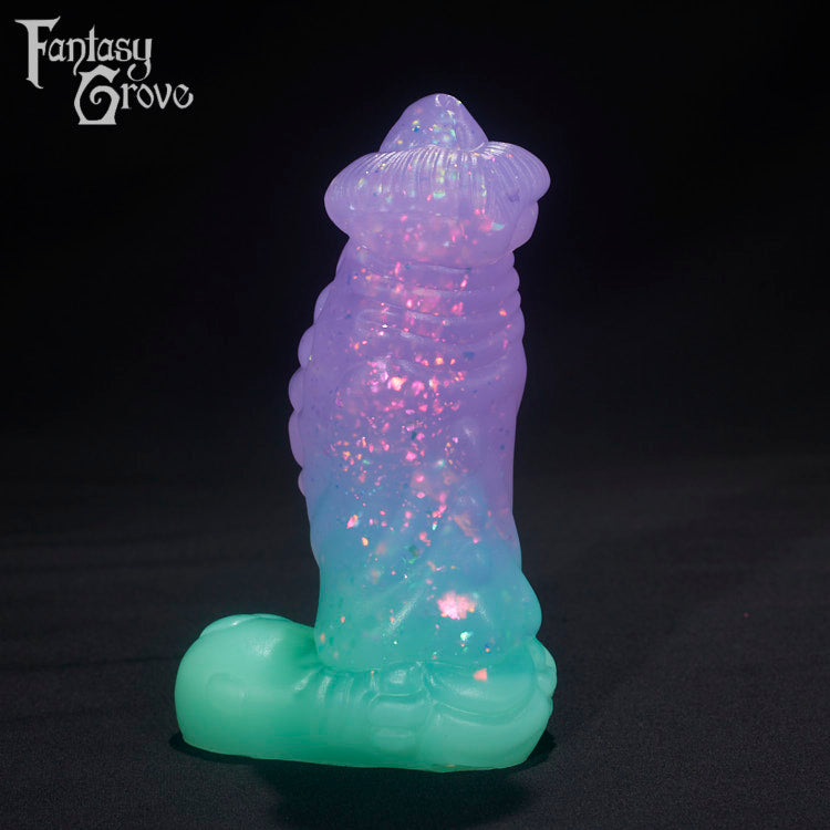 A fantasy sex toys on a black background with Fantasy Grove branding