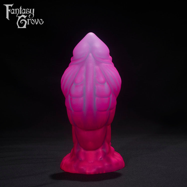 A Fantasy Grove sex toy on a black background with a logo in the upper left corner