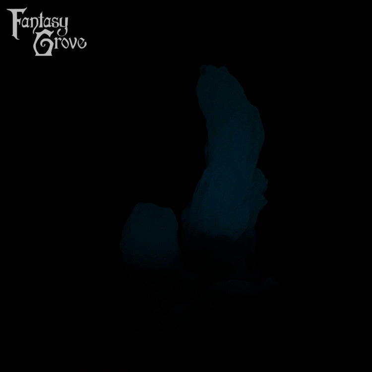 A Fantasy Grove sex toy on a black background with a logo in the upper left corner