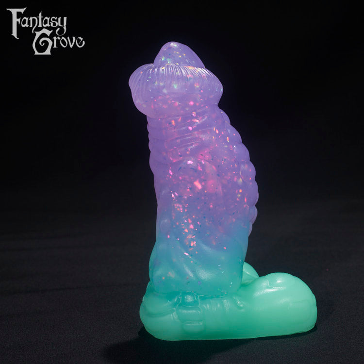 A fantasy sex toys on a black background with Fantasy Grove branding