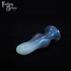 A fantasy sex toy on a black background with the Fantasy Grove logo in the upper left corner