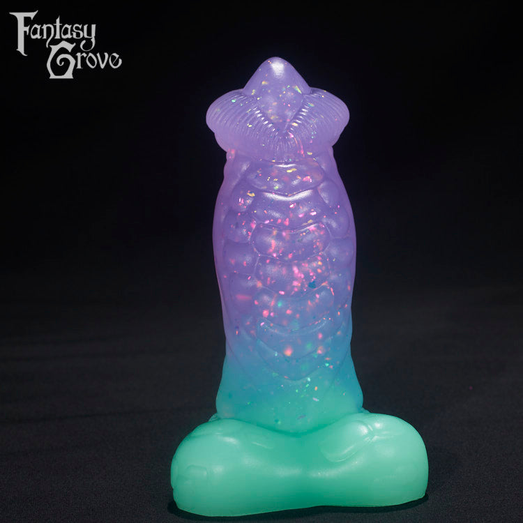 A fantasy sex toys on a black background with Fantasy Grove branding