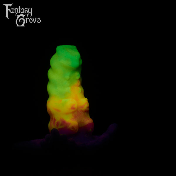 A fantasy sex toy on a black background with the Fantasy Grove logo in the upper left corner 