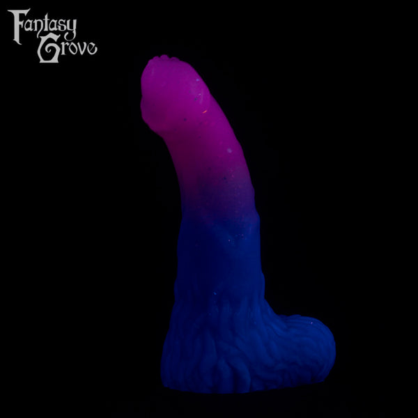 A fantasy sex toy on a black background with the Fantasy Grove logo in the upper left corner