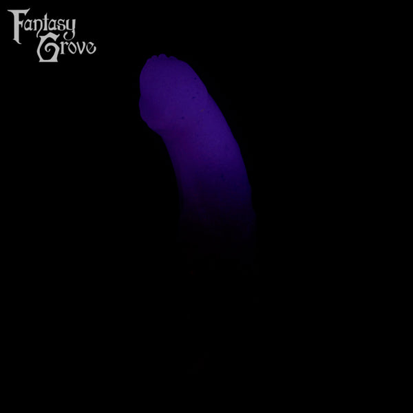 A fantasy sex toy on a black background with the Fantasy Grove logo in the upper left corner