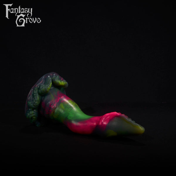 A fantasy sex toy on a black background with the Fantasy Grove logo in the upper left corner