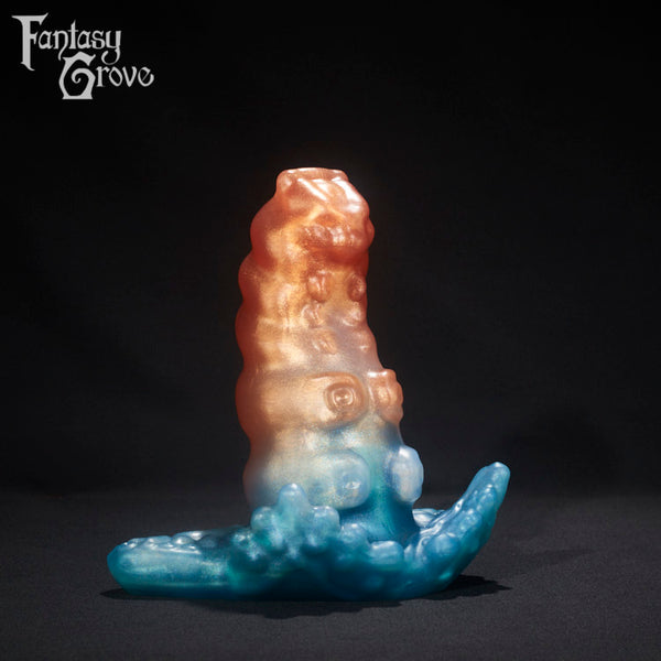 A fantasy sex toy on a black background with the Fantasy Grove logo in the upper left corner 