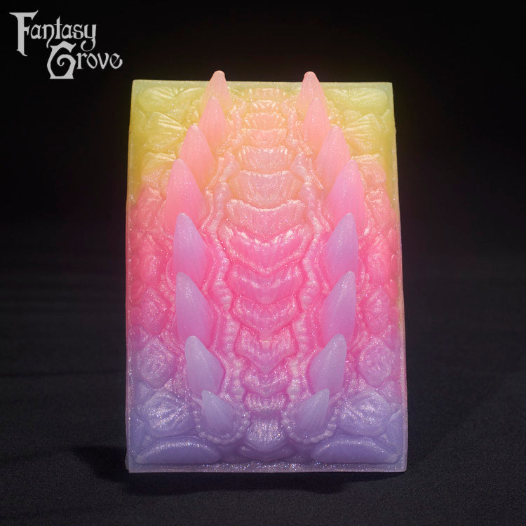 A Fantasy Grove sex toy on a black background with a logo in the upper left corner