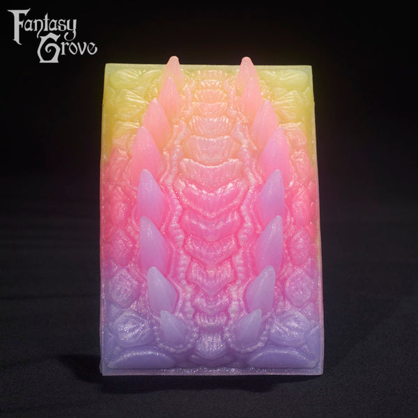 A Fantasy Grove sex toy on a black background with a logo in the upper left corner