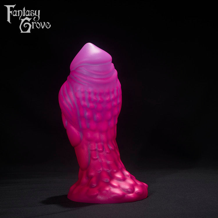 A Fantasy Grove sex toy on a black background with a logo in the upper left corner