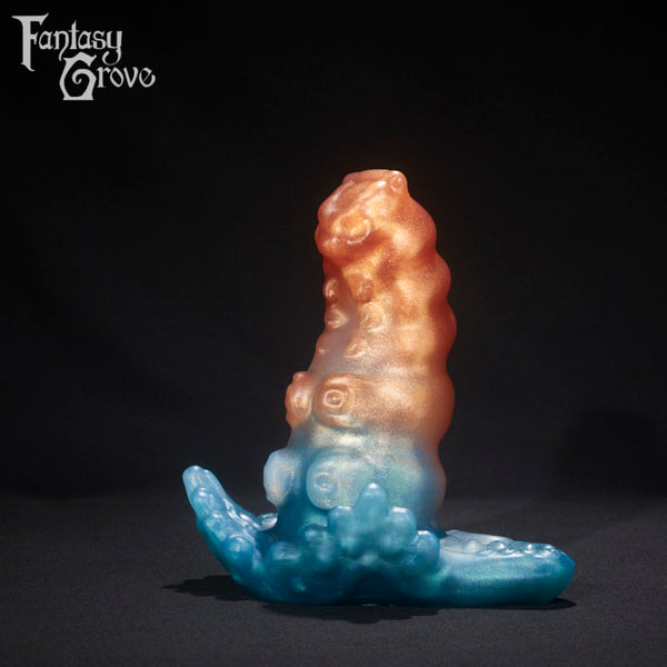A fantasy sex toy on a black background with the Fantasy Grove logo in the upper left corner 