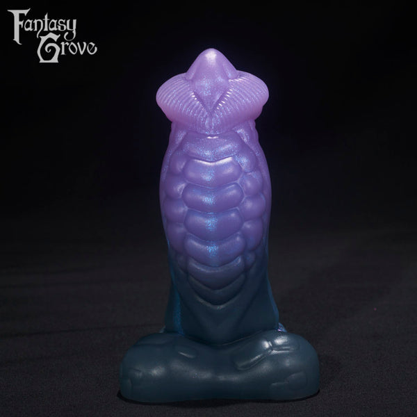 A fantasy sex toys on a black background with Fantasy Grove branding