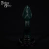 A fantasy sex toy on a black background with the Fantasy Grove logo in the upper left corner