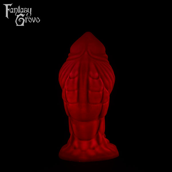 A Fantasy Grove sex toy on a black background with a logo in the upper left corner