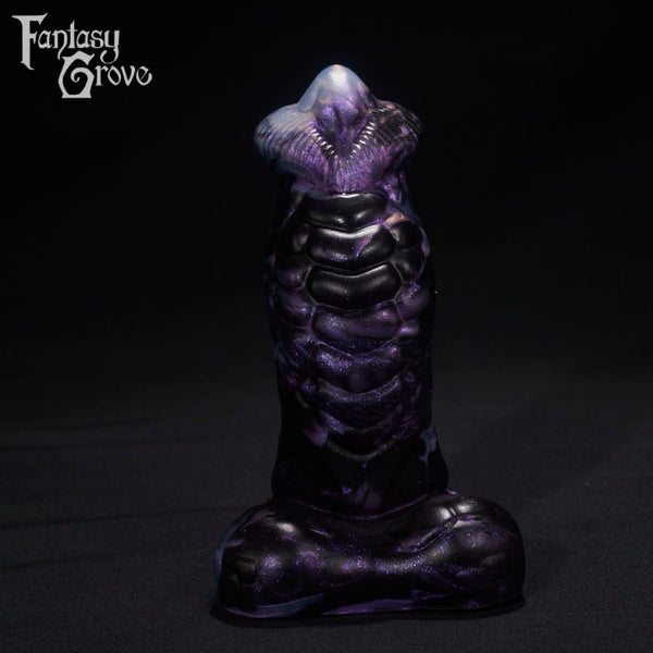 A fantasy sex toys on a black background with Fantasy Grove branding