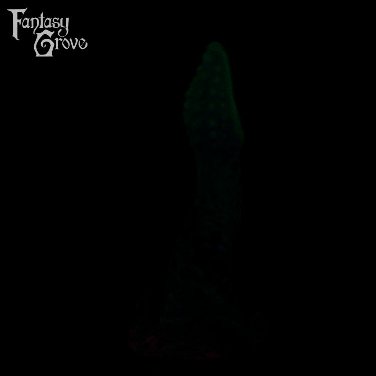 A fantasy sex toy on a black background with the Fantasy Grove logo in the upper left corner