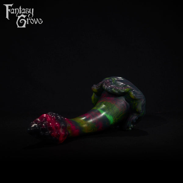 A fantasy sex toy on a black background with the Fantasy Grove logo in the upper left corner