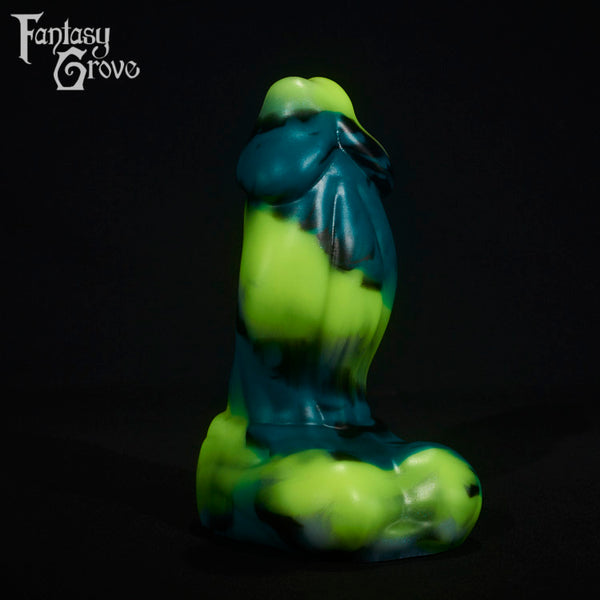 A fantasy sex toy on a black background with the Fantasy Grove logo in the upper left corner