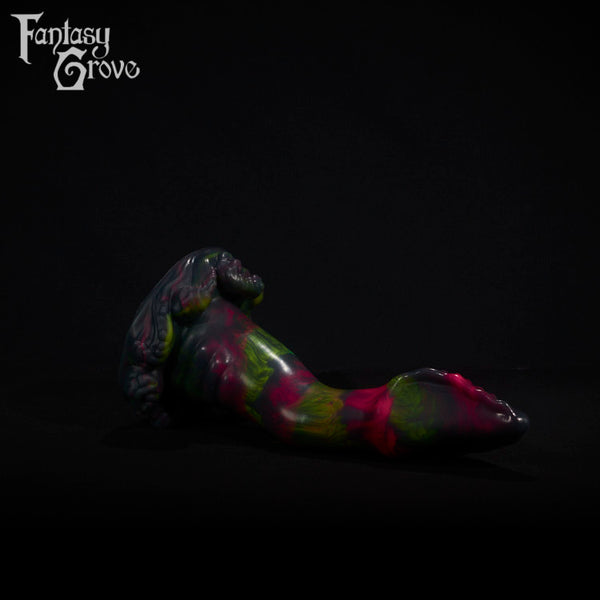 A fantasy sex toy on a black background with the Fantasy Grove logo in the upper left corner