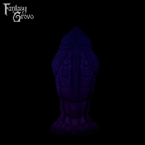 A Fantasy Grove sex toy on a black background with a logo in the upper left corner