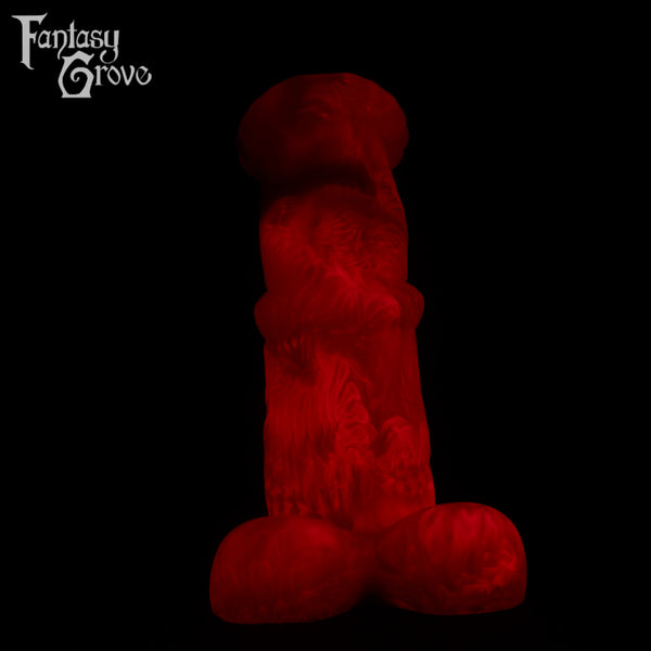 A fantasy sex toys on a black background with Fantasy Grove branding