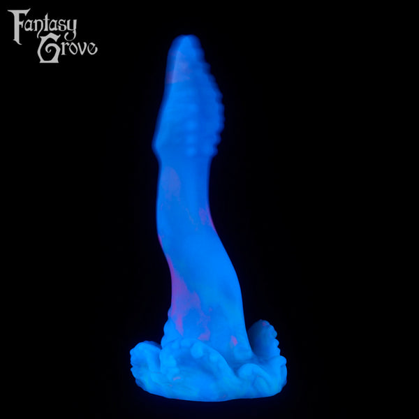 A fantasy sex toy on a black background with the Fantasy Grove logo in the upper left corner 