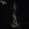 A fantasy sex toy on a black background with the Fantasy Grove logo in the upper left corner