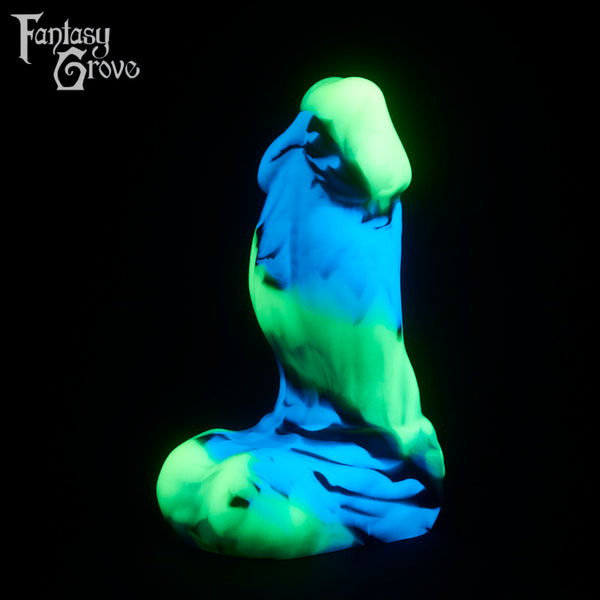 A fantasy sex toy on a black background with the Fantasy Grove logo in the upper left corner