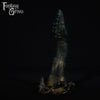 A fantasy sex toy on a black background with the Fantasy Grove logo in the upper left corner