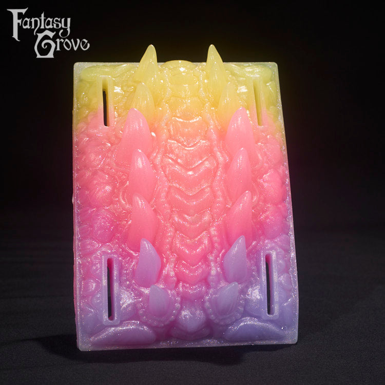 A Fantasy Grove sex toy on a black background with a logo in the upper left corner