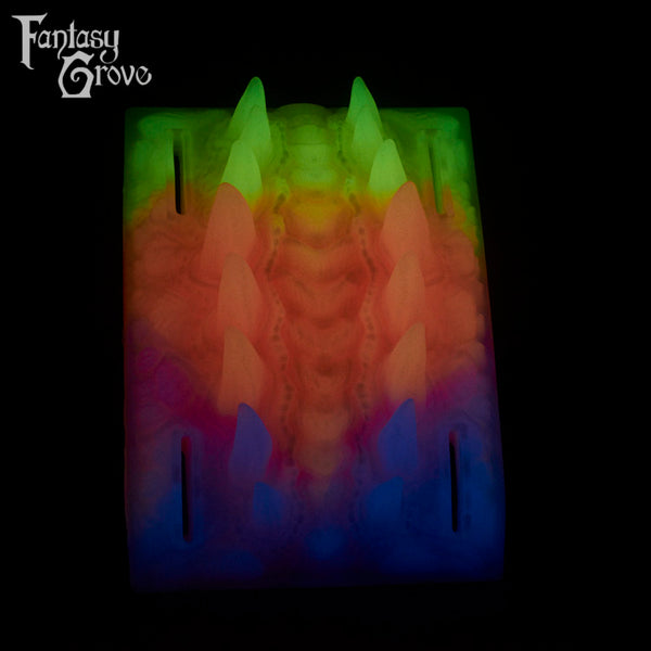 A Fantasy Grove sex toy on a black background with a logo in the upper left corner