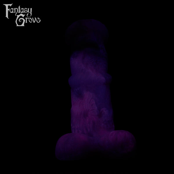 A fantasy sex toys on a black background with Fantasy Grove branding