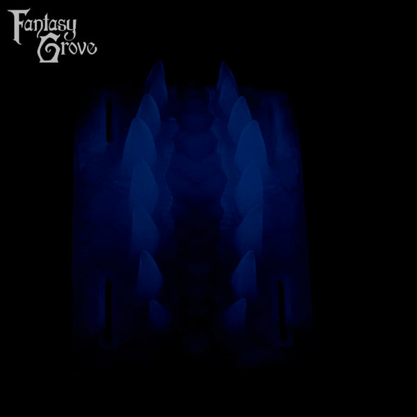 A Fantasy Grove sex toy on a black background with a logo in the upper left corner