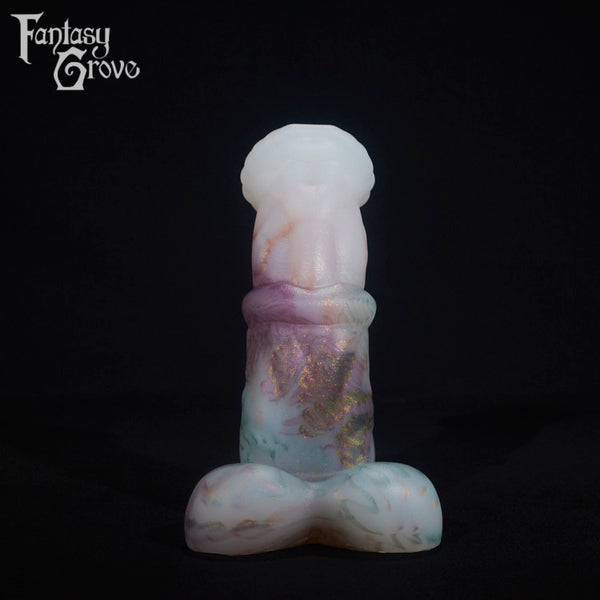 A fantasy sex toy on a black background with the Fantasy Grove logo in the upper left corner