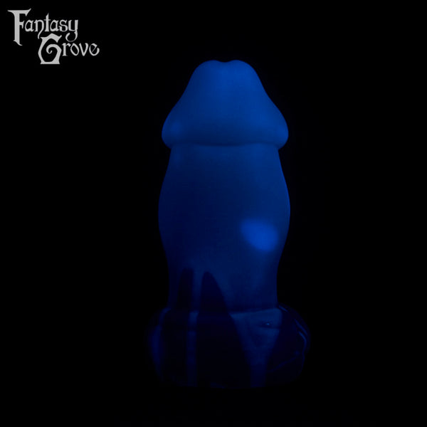 A fantasy sex toy on a black background with the Fantasy Grove logo in the upper left corner