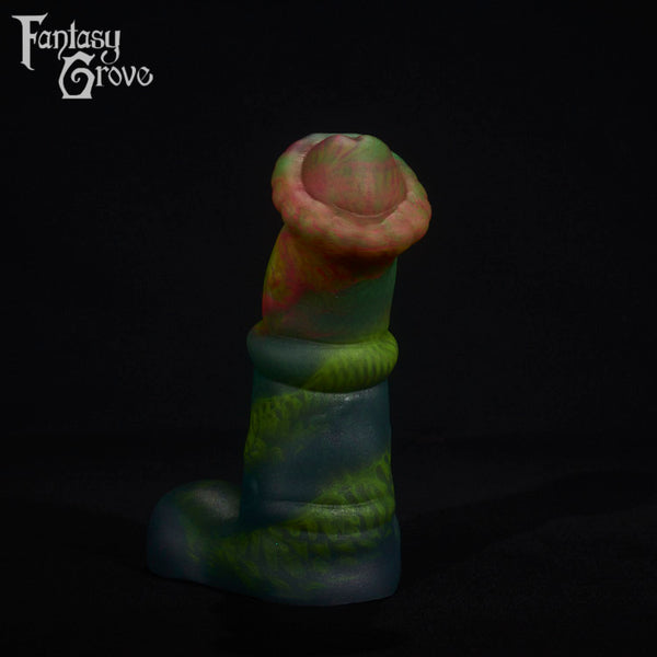 A fantasy sex toy on a black background with the Fantasy Grove logo in the upper left corner