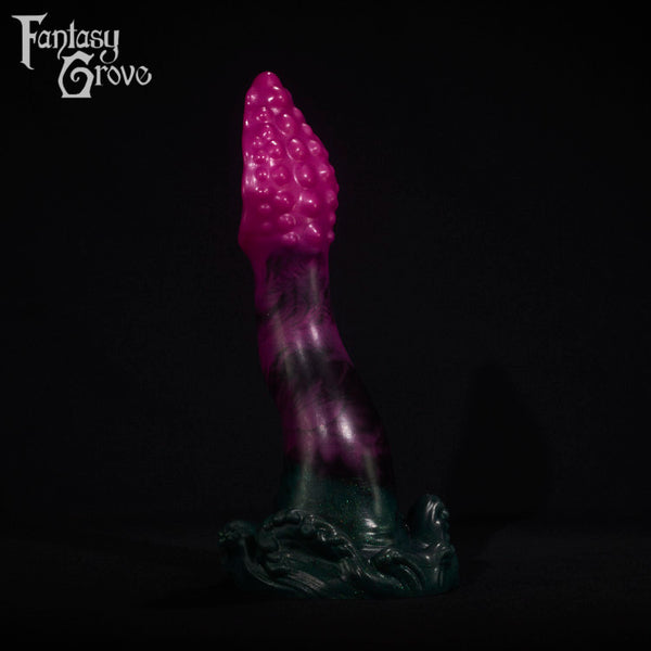 A fantasy sex toy on a black background with the Fantasy Grove logo in the upper left corner