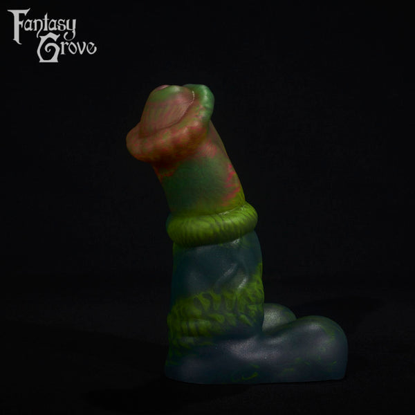 A fantasy sex toy on a black background with the Fantasy Grove logo in the upper left corner