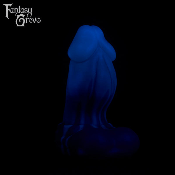 A fantasy sex toy on a black background with the Fantasy Grove logo in the upper left corner